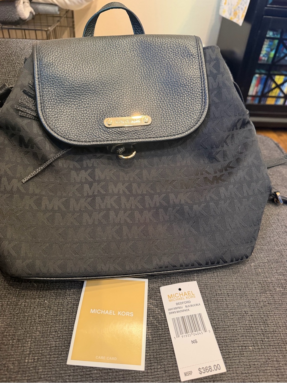 Michael Kors Black MK Signature Backpack with Gold Plate